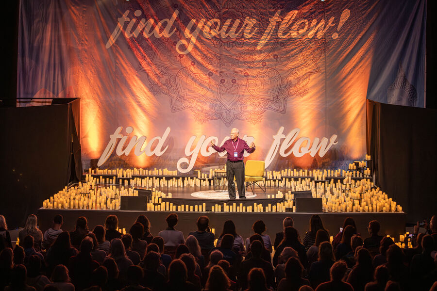Frank Kinslow on stage with audience